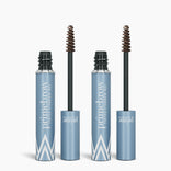Two open tubes of PrimePrometics™ 2pcs PrimeBrow Tinted Gel stand upright against a white background, featuring blue and silver packaging and mascara-style applicator wands coated in brown gel for excellent gray eyebrow coverage.