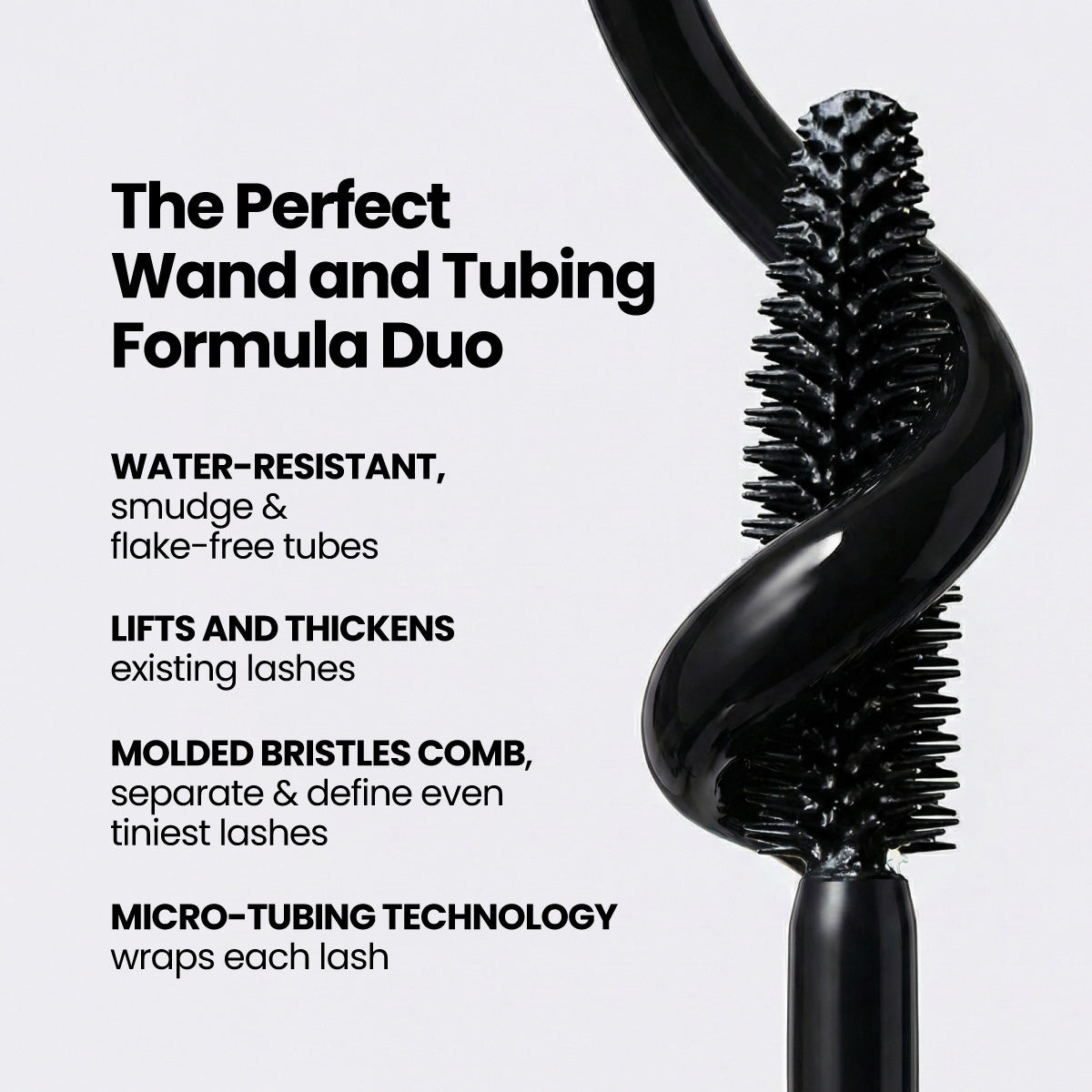 Close-up of a mascara wand with twisted tubing from the PrimePrometics™ Prime Mini Essentials Travel Kit, shown next to text that highlights its features: water-resistant formula, lifts and thickens lashes, molded bristles comb for separation, and innovative micro-tubing technology—an ideal addition to your beauty essentials or travel makeup kit.
