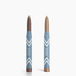 Two blue PrimePrometics™ cosmetic sticks with chevron patterns, shown uncapped to display shimmery brown and gold shades—2pcs PrimeEyes Eye Brightener, ideal as an eye brightener or under eye cream.