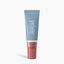 A blue and pink tube labeled prime prometics stands upright on a white background.