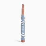 A metallic rose gold illuminating eyeshadow stick, the PrimeEyes Eye Brightener by PrimePrometics™, stands upright against a white background in its sleek blue and white tube—perfect for creating an effortless eye lift effect.