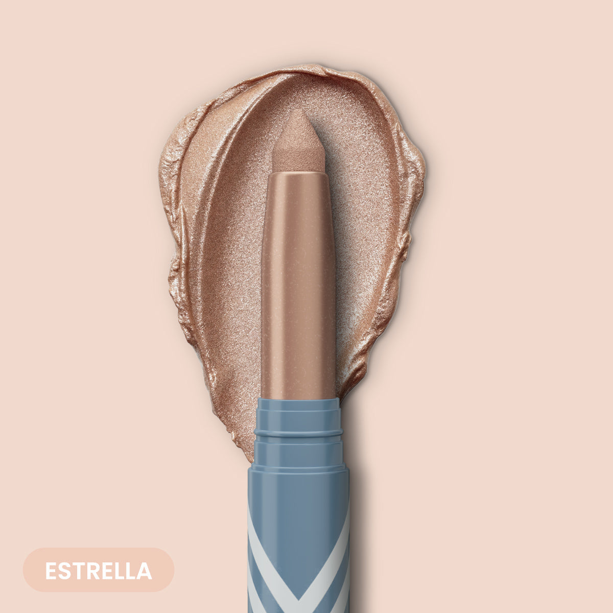 The PrimePrometics™ 2pcs PrimeEyes Eye Brightener features shimmery nude sticks in blue and white patterned casings, with a creamy metallic formula swatch and the shade name Estrella in a rounded box for an instant eye lift effect.