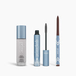 The PrimePrometics™ Prime Heroes Set, displayed on a white background, features three products—Color Changing Foundation (grey cap), PrimeLash Mascara (wand out), and PrimeEyes Glide eyeliner—each in sleek silver and blue packaging.