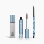 The PrimePrometics™ Prime Heroes Set features three blue and silver makeup products—a Color Changing Foundation bottle, an open PrimeLash Mascara with a brown wand, and a dual-ended PrimeEyes Glide eyeliner—on a white background.