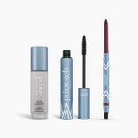 The PrimePrometics™ Prime Heroes Set features three blue and silver makeup essentials—a Color Changing Foundation, an open Mascara with brush, and a retractable Eyeliner pencil—displayed upright against a white background.