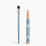 The PrimePrometics™ Radiance Duo, featuring a blue eyeshadow brush with a silver ferrule and a blue and gold cream eyeshadow stick labeled "prime," is displayed upright on a white background.