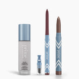 The PrimePrometics™ All-Day Confidence Bundle features four makeup products—a color changing foundation, a small vial, a maroon eyeliner pencil, and a metallic brown eyeshadow stick—all in blue and white packaging.