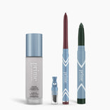 The PrimePrometics™ All-Day Confidence Bundle includes a color changing foundation, brightener with applicator, maroon glide eyeliner, and green twist-up eyeshadow stick—all in sleek light blue packaging.