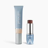 The PrimePrometics™ Complete Face Bundle features a blue tube and a blue-silver stick with minimalist design, both shown on a white background.