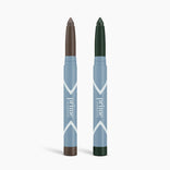 Two blue PrimePrometics™ 2pcs PrimeEyes Eyeshadow Matte sticks, one with a brown matte tip and the other with a dark green tip, stand upright on a white background.