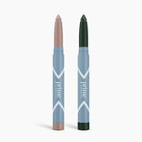 Two matte eye shadow sticks from PrimePrometics™ stand upright in blue packaging—one with a nude tip, the other dark green. This 2pcs PrimeEyes Eyeshadow Matte set offers versatile shades for any look.