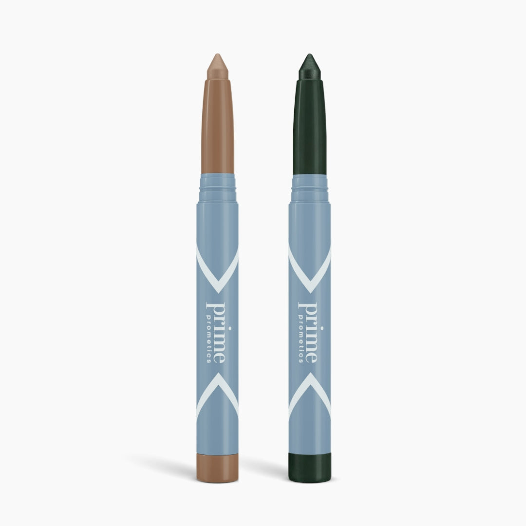 Two light blue makeup crayons labeled PrimePrometics™ stand upright on a white background. This 2pcs PrimeEyes Eyeshadow Matte Duo features a beige tip on the left and dark green tip on the right, ideal for versatile eye looks.