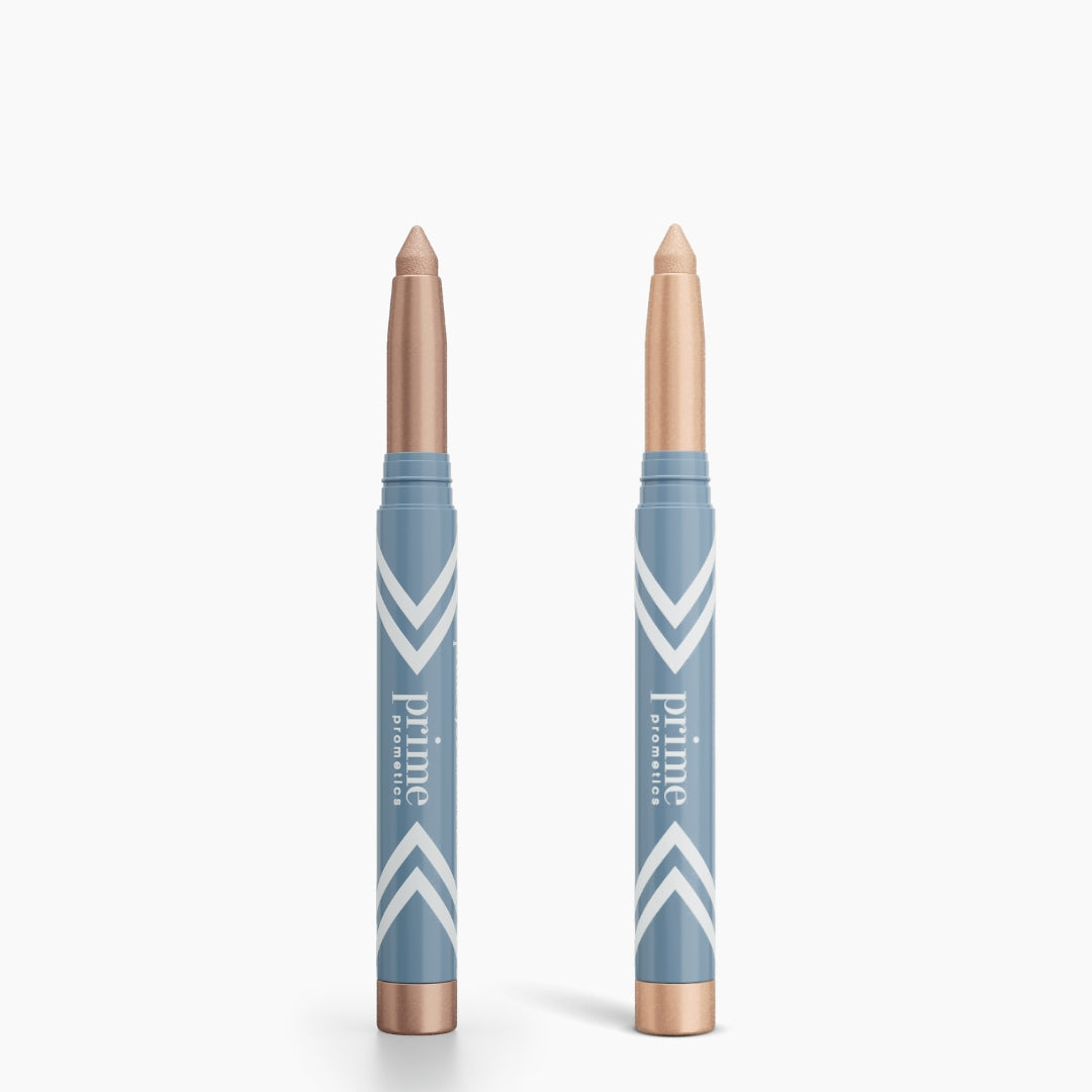 Two PrimePrometics™ 2pcs PrimeEyes Eye Brightener sticks, with blue and gold packaging and beige tips, stand upright on a white background. Designed for women over 50, they blur fine lines for a smooth eyeshadow finish.