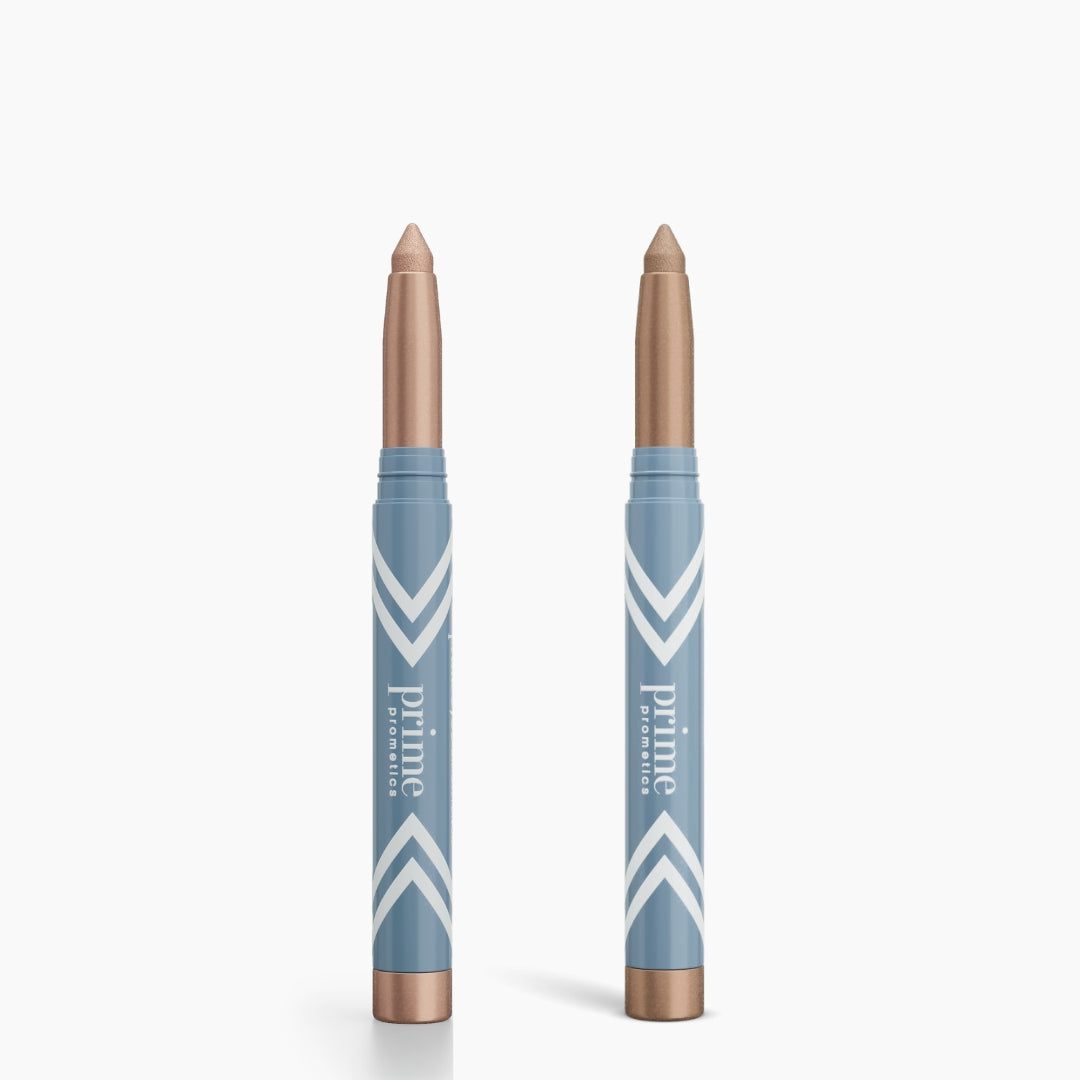 Two blue and rose gold tubes labeled 2pcs PrimeEyes Eye Brightener by PrimePrometics™ stand upright on a white background, featuring pointed tips for easy application and "prime promise" text with diagonal stripes on the packaging.