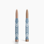 Two blue and rose gold tubes labeled 2pcs PrimeEyes Eye Brightener by PrimePrometics™ stand upright on a white background, featuring pointed tips for easy application and "prime promise" text with diagonal stripes on the packaging.