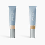 Two upright tubes of PrimePrometics™ 2pcs PrimeSkin CC+ Cream, a lightweight foundation for women over 50, are shown on a white background. The left tube is labeled Fair; the right, Golden Medium. Both feature blue bodies, silver caps, and beige bases.