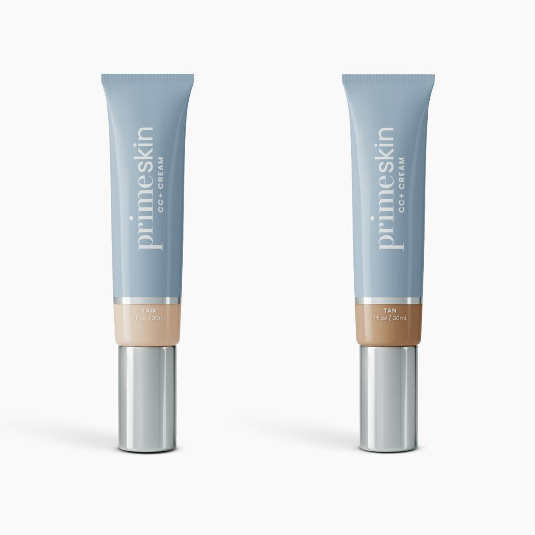 Two tubes of PrimePrometics™ 2pcs PrimeSkin CC+ Cream in Fair and Tan are shown on a white background. The light blue and silver packaging offers foundations for women over 50, visibly blurring pores for a flawless finish.