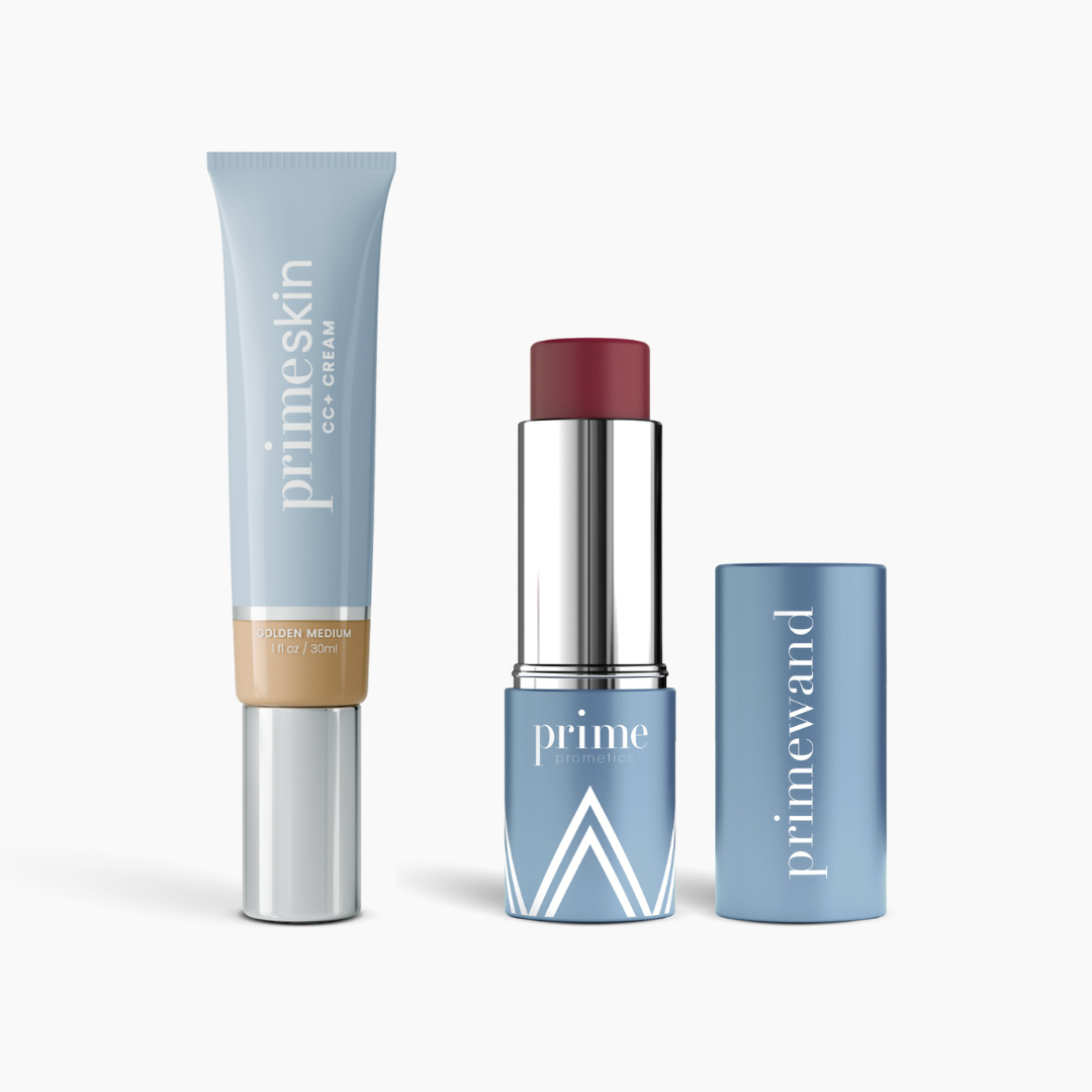 The Complete Face Bundle by PrimePrometics™ includes a blue tube of PrimeSkin CC+ Cream and a sleek blue PrimeWand Pigment lipstick with berry shade, both featuring modern design on white packaging.