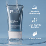 A tube of PrimePrometics™ Multi-Peptide Hair Density Serum surrounded by splashes of water. Text highlights key features: supports fuller-looking hair, contains a multi-peptide complex, and includes a built-in brush. The background features a soft blue shade.