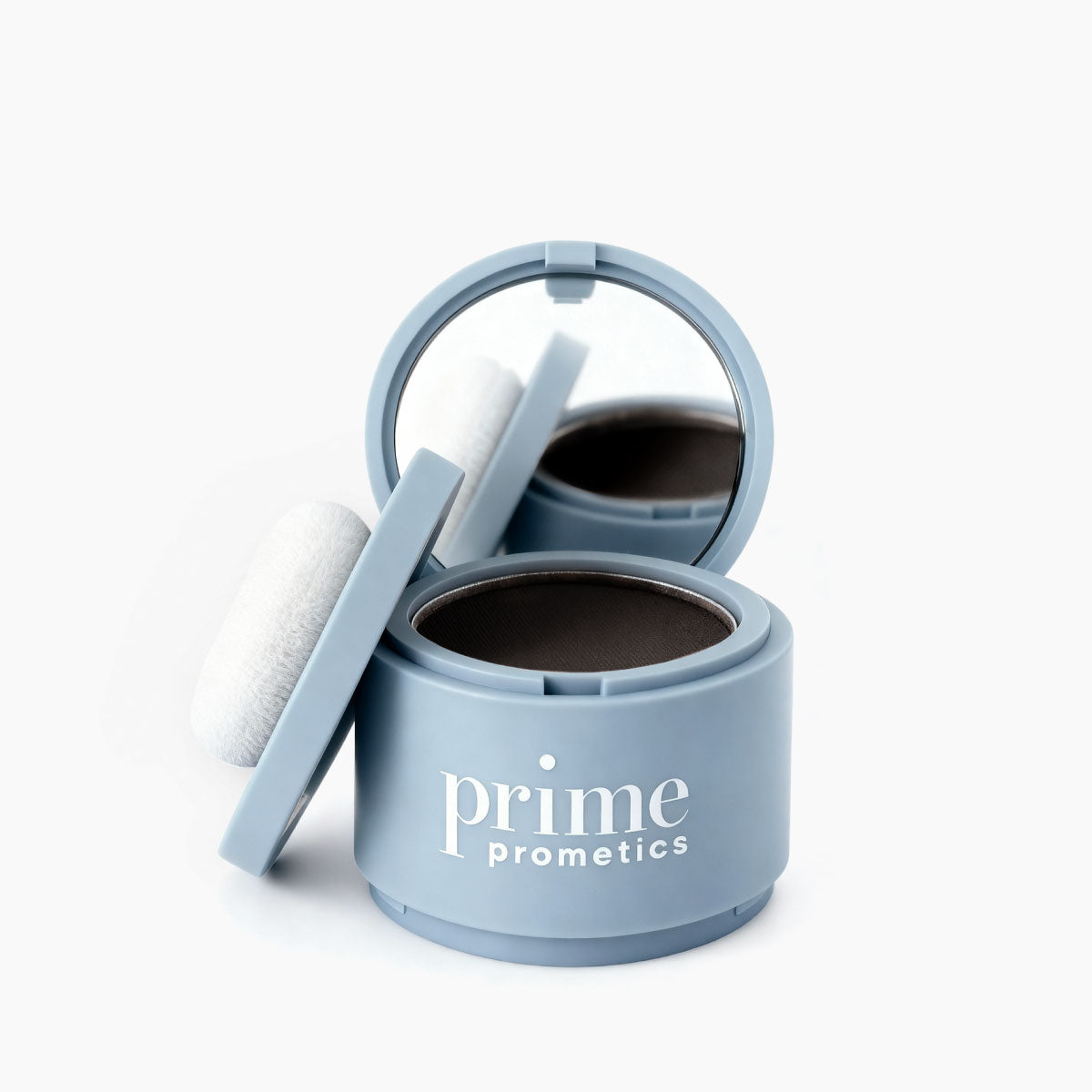 A blue container of PrimePrometics™ Instant Coverage Hairline Powder with a built-in mirror and a white puff applicator on the side, displayed on a white background. Ideal for concealing hair thinning.