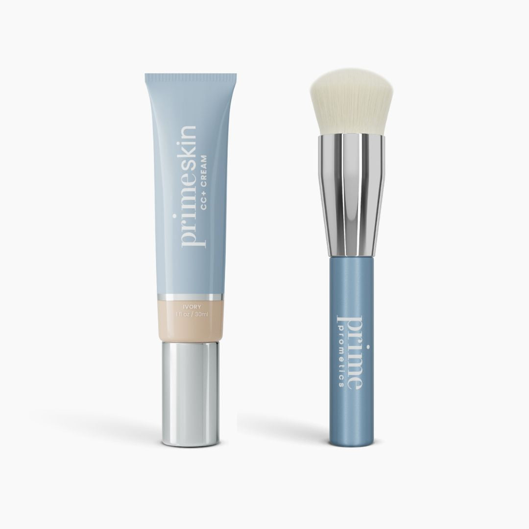 A Flawless Finish Bundle by PrimePrometics™—a blue tube of CC+ Cream in Ivory and a matching blue-handled foundation brush with a silver ferrule and white bristles—are displayed on a white background.
