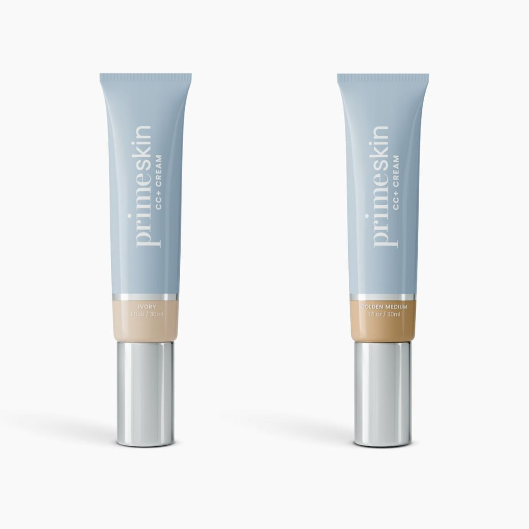 Two light blue tubes of PrimePrometics™ 2pcs PrimeSkin CC+ Cream with silver caps, labeled Ivory and Golden Medium (1 fl oz/30 mL each), are shown. Ideal as a foundation for women over 50, this CC+ Cream blurs pores for a smooth look.