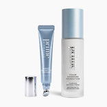 The Lift Me Up Duo from PrimePrometics™ features two silver and blue cosmetic products: an Instant Eye Tightener tube with its cap removed for beautifully lifted eyes, and a Color Changing Foundation bottle labeled for fair to medium skin tones.
