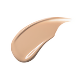 A smooth, creamy beige foundation or makeup swatch with a glossy texture, spread across a white background.