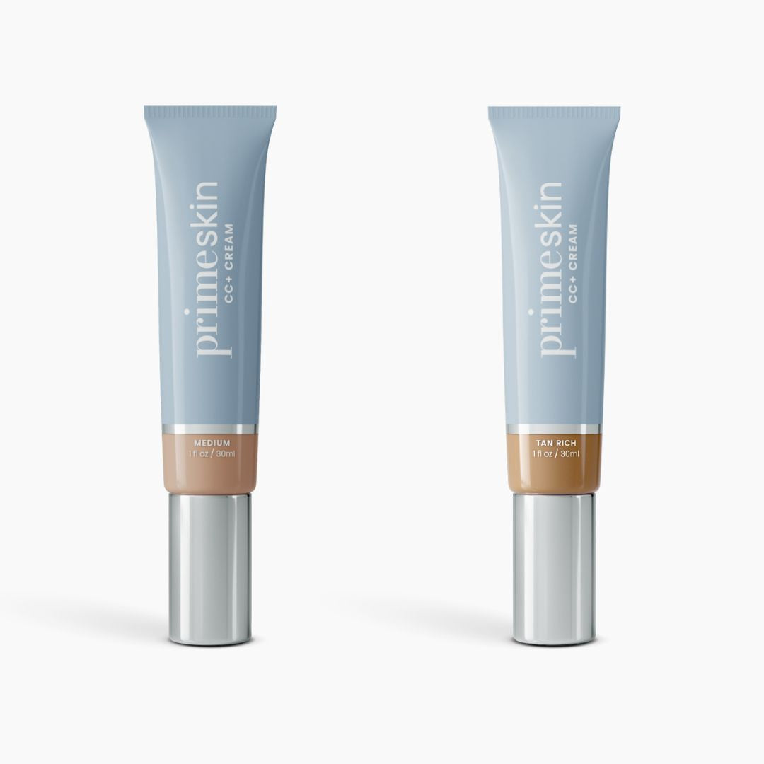 Two upright tubes of PrimePrometics™ 2pcs PrimeSkin CC+ Cream—a lightweight, pore-blurring foundation—are shown. The left tube is labeled Medium and the right Tan Rich, both in light blue packaging with silver caps.