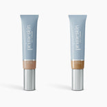 Two upright tubes of PrimePrometics™ 2pcs PrimeSkin CC+ Cream—a lightweight, pore-blurring foundation—are shown. The left tube is labeled Medium and the right Tan Rich, both in light blue packaging with silver caps.