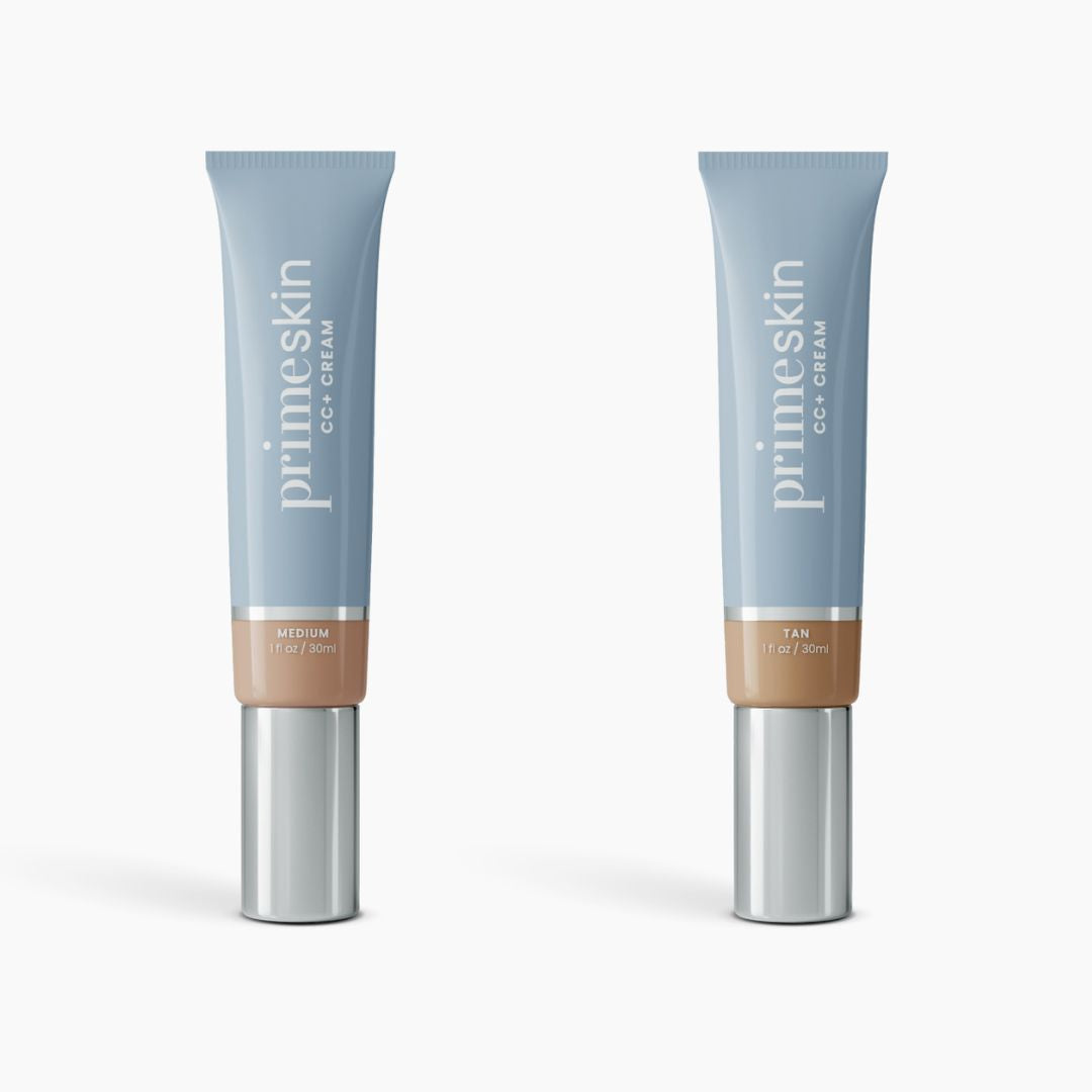 Two upright tubes of PrimePrometics™ 2pcs PrimeSkin CC+ Cream (Medium and Tan) stand on a white background. Each blue tube with a silver cap holds 1 fl oz (30 ml) of lightweight, pore-blurring foundation.