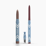 PrimePrometics™ Eye Lift Duo features two blue pencils with white chevrons—one brown, one maroon—ideal eyeliners for women over 50. A small detachable sharpener with a clear cap rests between this water-resistant pair.