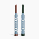 Two blue PrimePrometics™ 2pcs PrimeEyes Eye Brightener twist-up sticks with chevron patterns, featuring shimmery bronze and deep green tips, stand upright on a white background for easy and effortless eye care.