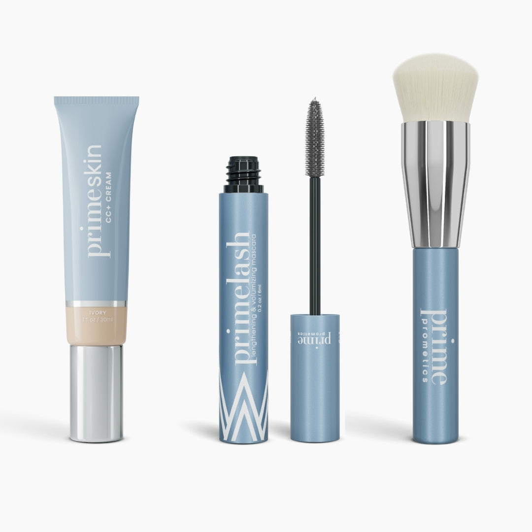 The PrimePrometics™ Effortless Beauty Complete Bundle includes four light blue cosmetics: CC+ Cream, open and closed Mascaras, and a Foundation Brush with a white bristle head.