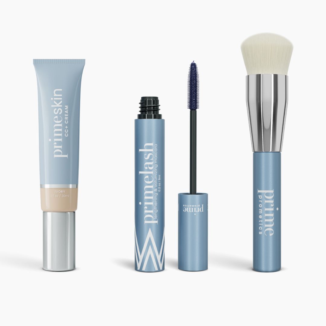 The Effortless Beauty Complete Bundle by PrimePrometics™ features four blue products: a CC+ Cream tube, an opened mascara with brush, a closed mascara tube, and a foundation brush with white bristles and silver ferrule.