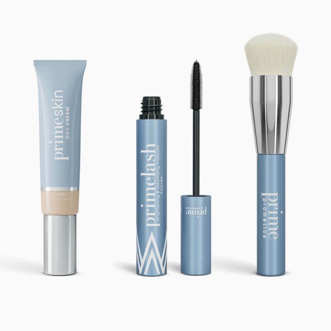 The Effortless Beauty Complete Bundle from PrimePrometics™ includes four light blue cosmetic products: a primeskin CC+ Cream tube, a primelash mascara with its wand exposed, and a Foundation Brush labeled primepromoter.