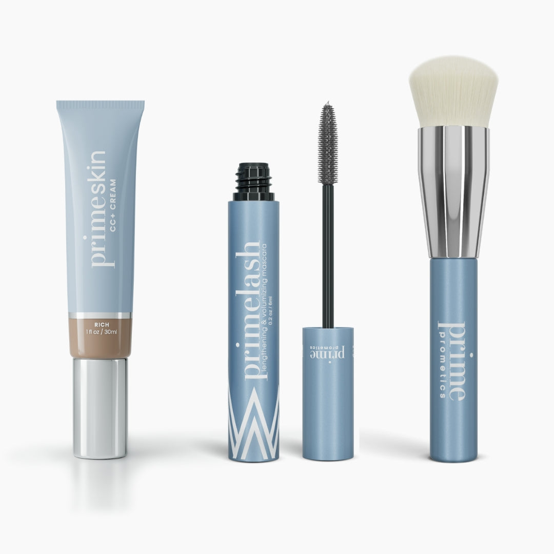 The Effortless Beauty Complete Bundle by PrimePrometics™ features four blue and silver products: a primeskin CC+ Cream, primelash Mascara with visible wand, and a Foundation Brush—each standing upright.