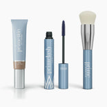 Four PrimePrometics™ Effortless Beauty Complete Bundle products are displayed: a CC+ Cream tube, mascara with wand out, small primer, and a foundation brush with white bristles and a blue handle.