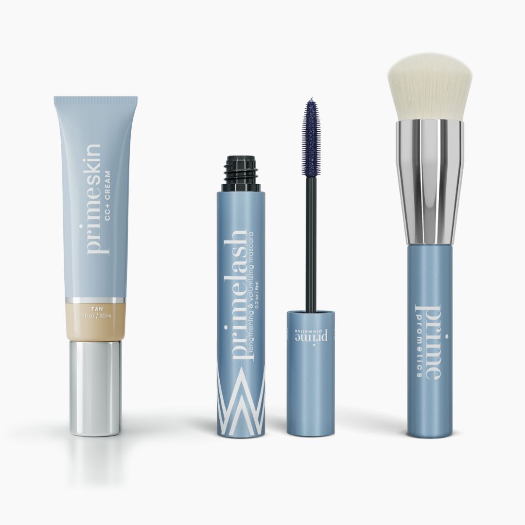 The Effortless Beauty Complete Bundle by PrimePrometics™ features four blue and silver makeup essentials: CC+ Cream, Mascara with wand, and a soft-bristled Foundation Brush, all displayed on a white background.