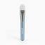 PrimePrometics™ PrimeLift Precision Applicator Brush featuring an ultra-soft white synthetic bristle head, silver ferrule, and metallic blue handle, designed to be gentle on mature skin.