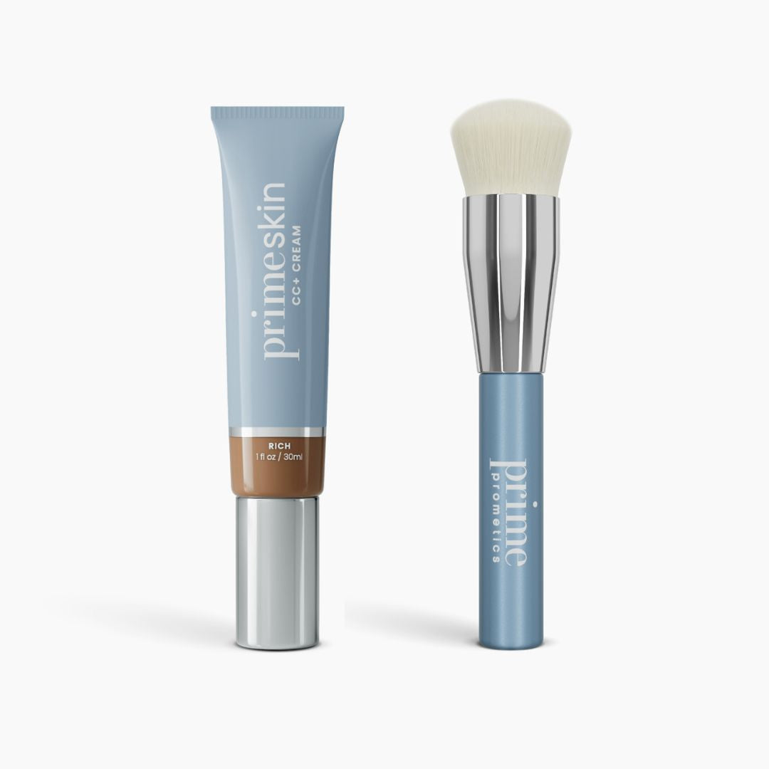 The Flawless Finish Bundle by PrimePrometics™ features a tube of CC+ Cream in Rich and a matching blue-handled foundation brush with a silver ferrule and white bristles, both displayed on a plain white background.