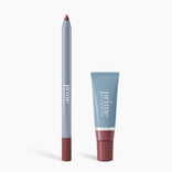 The Soft Lip Duo by PrimePrometics™ includes a blue Velvet Lip Contour pencil and matching lip gloss, both labeled with the brand name and featuring brownish-pink caps and tips, all displayed on a white background.