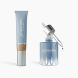 The PrimePrometics™ Prep & Prime Bundle includes a blue tube of CC+ Cream in tan and a blue glass bottle of Magic Repair Serum with dropper, giving you both flawless coverage and nourishing repair in one set.