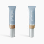 Two light blue tubes of 2pcs PrimeSkin CC+ Cream by PrimePrometics™, each 1 fl oz/30ml in “Tan” and “Golden Medium,” feature silver caps and beige bases. This lightweight foundation blurs pores for a smooth finish, ideal for women over 50.