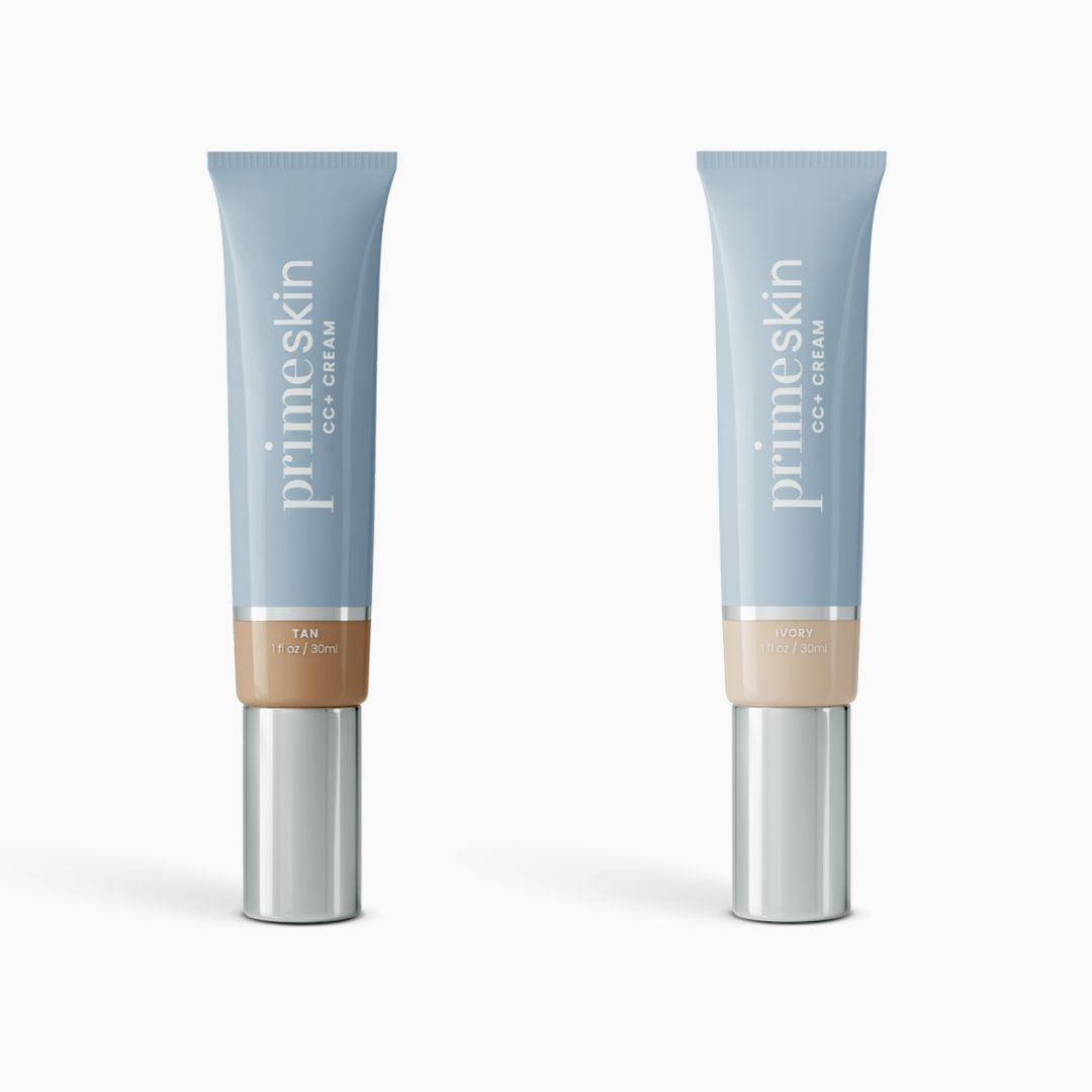 Two blue tubes of 2pcs PrimeSkin CC+ Cream by PrimePrometics™—Tan on the left, Ivory on the right—stand upright with silver caps. Their lightweight formula blurs pores for a flawless look against a white background.