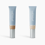 Two blue tubes of 2pcs PrimeSkin CC+ Cream by PrimePrometics™—Tan on the left, Ivory on the right—stand upright with silver caps. Their lightweight formula blurs pores for a flawless look against a white background.