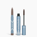 Two blue cosmetic products stand upright: an open tube of Iconic Matte Eye Kit mascara with a wand and a matching eyeshadow stick with the tip exposed. Both feature white geometric designs and PrimePrometics™ branding.