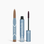 Two light blue Iconic Matte Eye Kit products by PrimePrometics™: a retractable eyebrow pencil with brown tip on the left, and an open mascara tube with black wand and cap on the right, both labeled with the brand name.