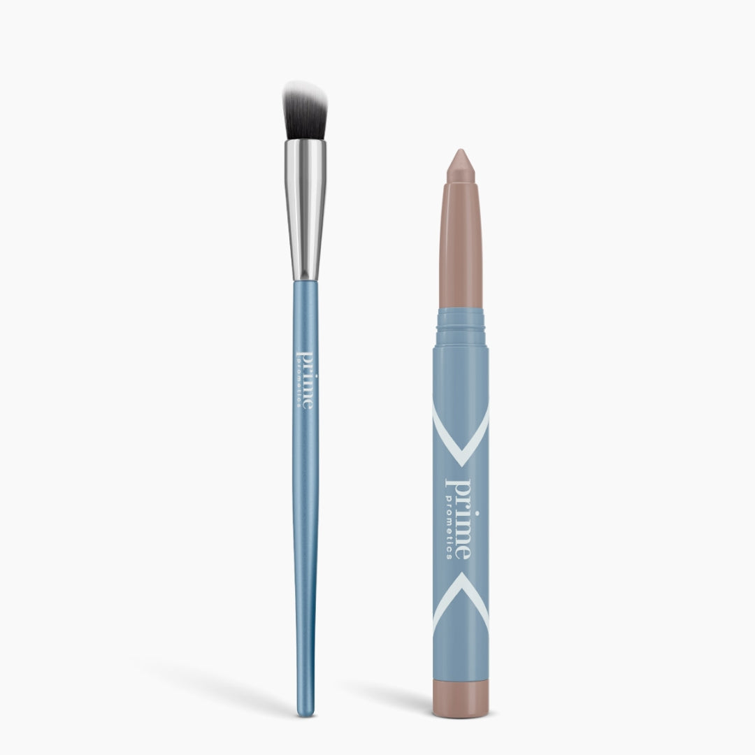 A Seamless Shadow Bundle Matte by PrimePrometics™—featuring a blue-handled brush with white bristles and a matching blue matte eyeshadow stick with taupe tip, both labeled "prime."—stands upright on a white background.