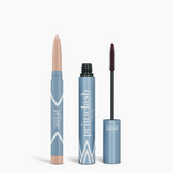 Two blue tubes from PrimePrometics™’ Iconic Matte Eye Kit stand upright: a twist-up nude makeup stick on the left and an open PrimeLash Mascara on the right—perfect to pair with any matte eyeshadow look.